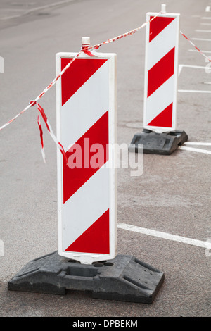 Red and white barrier signs. Road under construction Stock Photo