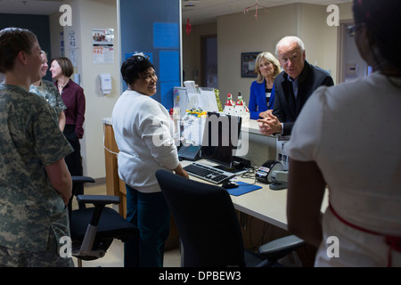 Vice President Joe Biden and Dr. Jill Biden thank nurses during a Christmas Day visit to Walter Reed National Military Medical Center, in Bethesda, Maryland, Dec. 25, 2013. Stock Photo