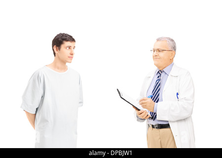 Doctor diagnosing a concerned male patient Stock Photo