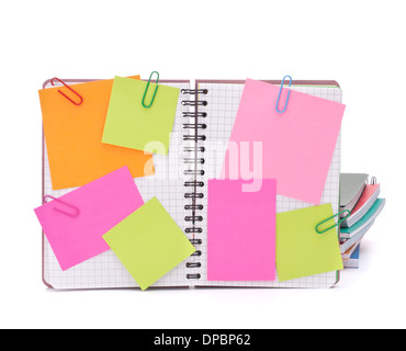 Blank checked notebook with notice papers isolated on white background cutout Stock Photo
