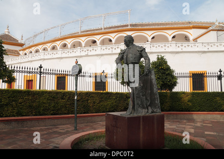 Statue of Matador Curro Romero, Plaza de Toros de la Real Maestranza de Caballería de Sevilla (bull ring), Seville, Spain. Stock Photo