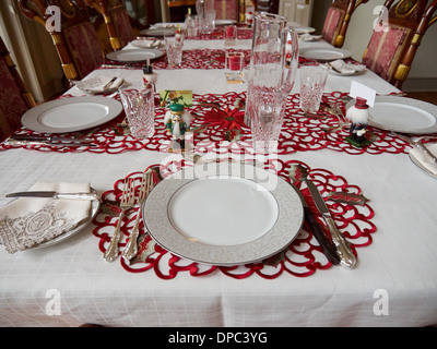 Elegant table setting for a festive Christmas meal Stock Photo