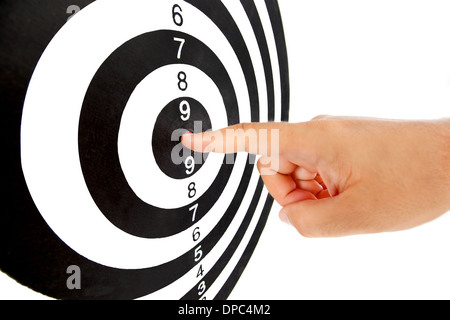 Finger on the center of the target. Stock Photo