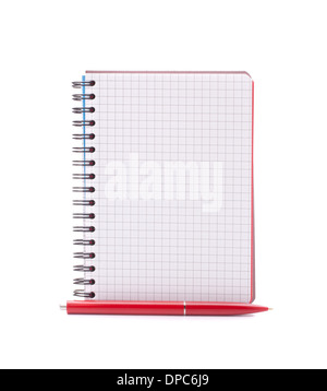 Open blank checked notebook with red pen isolated on white background cutout Stock Photo