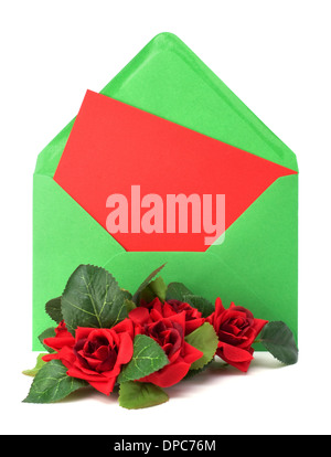 Envelope with floral decor. Flowers are artificial. Stock Photo