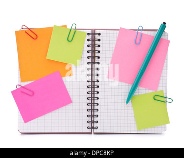Blank checked notebook with notice papers isolated on white background cutout Stock Photo