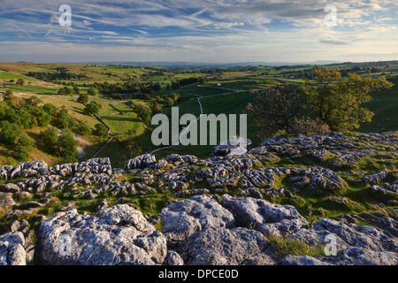 Late summer light from the limestone pavement at Malham Cove in the Yorkshire Dales of England Stock Photo