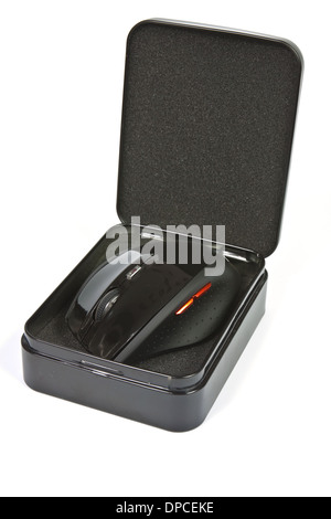 Wireless optical mouse placed in a black metal box Stock Photo