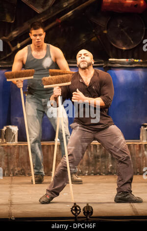 Stomp, the percussion musical that originated in Brighton, England, performs in London Ontario, Canada on March 11, 2014. The musical act uses ordinary objects and individual movements to create a 'physical theatre' performance. Stock Photo