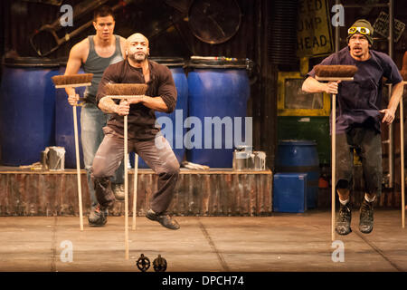 Stomp, the percussion musical that originated in Brighton, England, performs in London Ontario, Canada on March 11, 2014. The musical act uses ordinary objects and individual movements to create a 'physical theatre' performance. Stock Photo