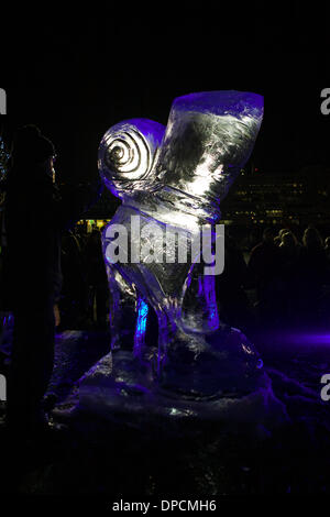 London, UK, 11th January 2014. Thousands of visitors attend London’s 3-day International Ice Sculpting festival at Canary Wharf. (10-11-12 January 2014). 20 of the best international ice sculptors compete to win the festival trophy. Stock Photo