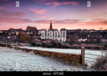 Malmesbury, UK. 12 January 2014. The first rays of sunlight hit the frozen landscape of Malmesbury in Wiltshire. A high pressure system brings a temporary respite from the heavy rain of the past few weeks. Credit:  Terry Mathews/Alamy Live News Stock Photo