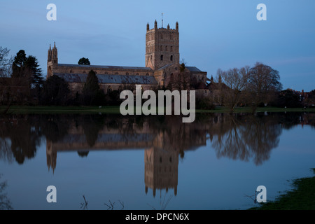 Tewkesbury Abbey, during winter flooding, at sunset Stock Photo