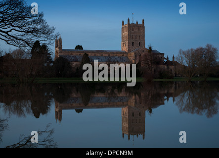 Tewkesbury Abbey, during winter flooding, at sunset Stock Photo