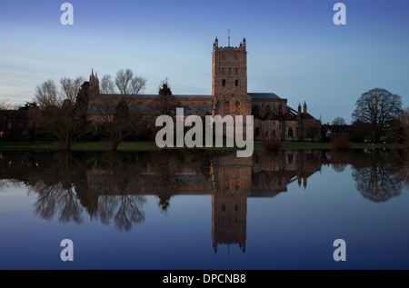 Tewkesbury Abbey, during winter flooding, at sunset Stock Photo