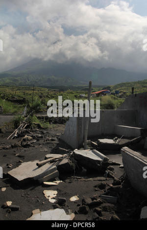 Damage to village from Pyroclastic flow of Mt Merapi eruption smoking ...