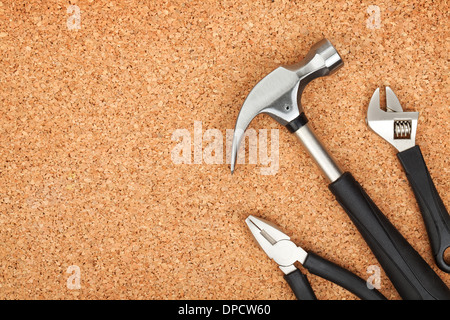 Set of tools on cork panel background with copy space Stock Photo