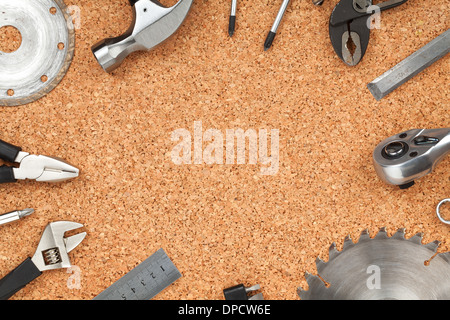Set of tools on cork panel background with copy space Stock Photo