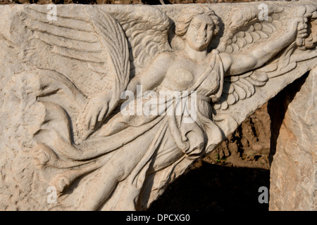 Turkey, Kusadasi, Ephesus. Marble carving of Nike, the goddess of sport, aka Winged Victory. Stock Photo