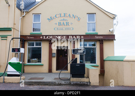 A petrol station and village pub in front of village of Malin in Donegal, in the north west of Ireland. Pumps Stock Photo