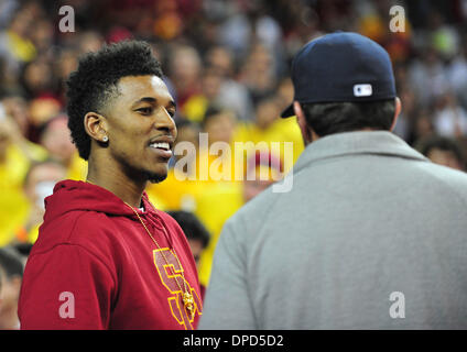 January 12, 2014: Matt Leinart chats with Nick Young of the Lakers during the NCAA basketball game between the Arizona Wildcats and the USC Trojans at the Galen Center in Los Angeles, CA John Green/CSM Stock Photo