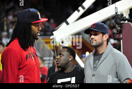 January 12, 2014: Matt Leinart chats with Jordan Hill of the Lakers during the NCAA basketball game between the Arizona Wildcats and the USC Trojans at the Galen Center in Los Angeles, CA John Green/CSM Stock Photo