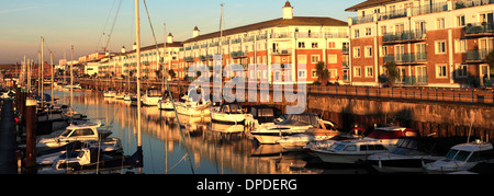 Dawn, boats and houses in Brighton Marina, Brighton & Hove, Sussex County, England, UK Stock Photo