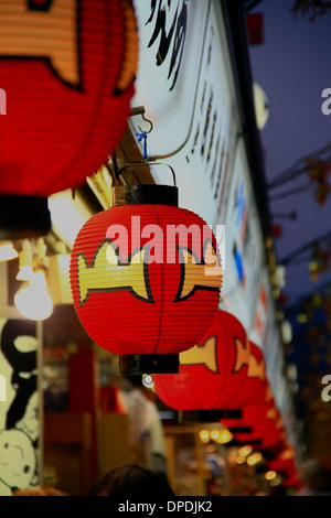 Red paper lanterns in the market at Asakusa near Senso-ji, Tokyo, Japan. Stock Photo