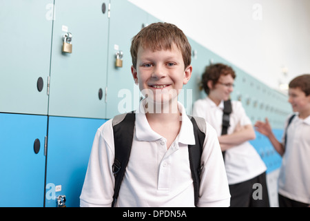 Portrait of schoolboy in corridor Stock Photo