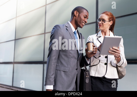 Portrait of businesspeople using digital tablet Stock Photo