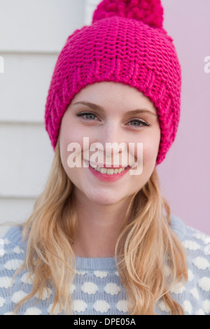 Portrait of young woman in wooly hat Stock Photo