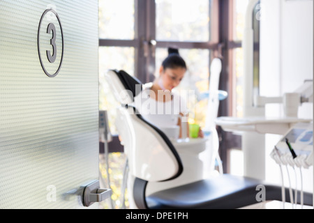 Dental nurse working in dentists Stock Photo