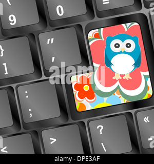 owl on computer keyboard key with flowers Stock Photo