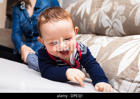 Happy baby boy laughing and having fun Stock Photo