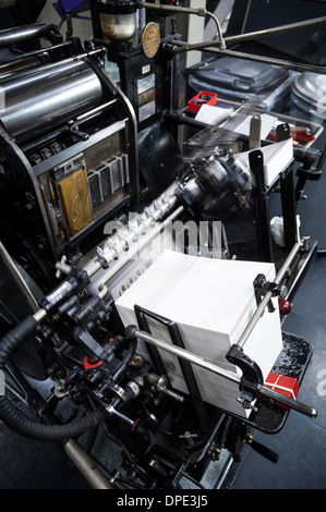 Paper printing machine at work in print workshop Stock Photo