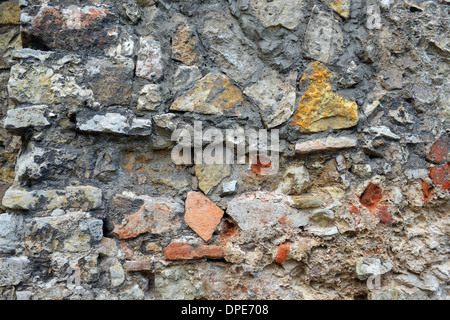 Old Stone Wall - Part of Ruins. Stone Wall Background Stock Photo