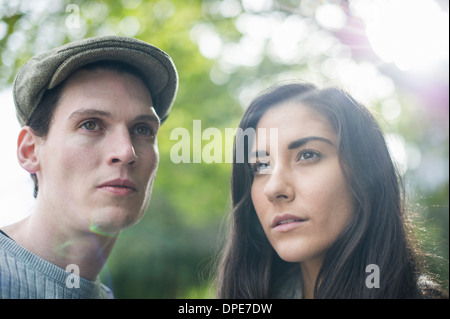 Portrait of young couple, man wearing flat cap Stock Photo