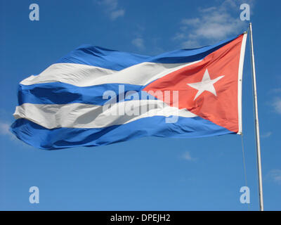 Mar 28, 2006 - Havana, CUBA - The Cuban Flag in the Vedado. The Republic of Cuba is located in the northern Caribbean and south of the United States. The first European to visit Cuba was explorer Christopher Columbus in 1492. Centuries of colonial rule and revolutions followed. Batista was deposed by Fidel Castro and Che guevara in 1953. After the revolution trade with comminist Ru Stock Photo