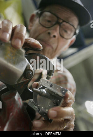 (Published 6/26/2005, B-7:1,2,3) Michael Alianelli, 97 rivoted a wire strut for a Boeing P-26 ''Peashooter'' airplane being restored at the San Diego Aerospace Museum in Balboa Park. Michael has volunteered at the Museum for 25 years. UT/DON KOHLBAUER Stock Photo
