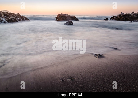 Sea and rocks at sunrise, Monterey Bay area, California, USA Stock Photo