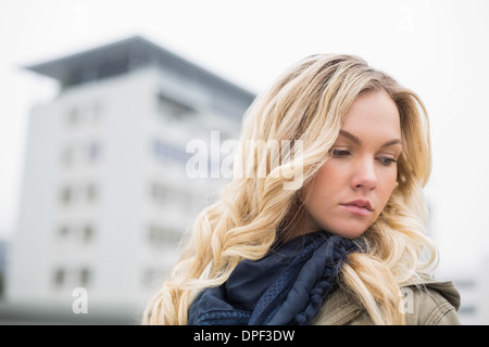 Young attractive blonde posing outdoors Stock Photo