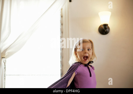 Portrait of young girl pulling a face Stock Photo