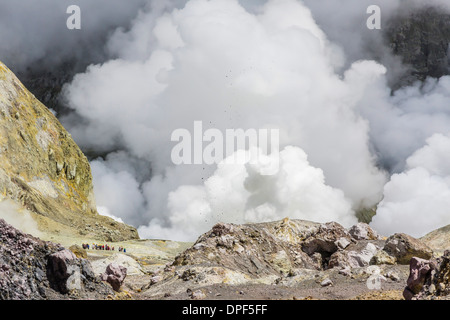 Visitors to an active andesite stratovolcano on White Island, off the East side of North Island, New Zealand, Pacific Stock Photo