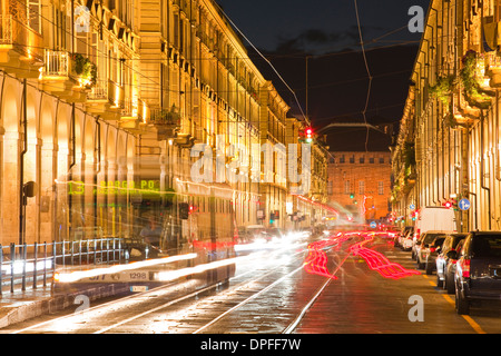 Via Po avenue lit up at night by passing traffic, Turin, Piedmont, Italy, Europe Stock Photo
