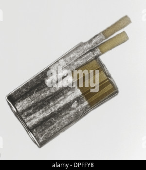 Colorized X-ray of a pack of cigarettes Stock Photo