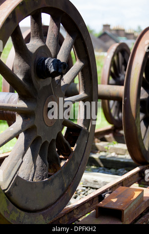 steam engines wheels in sidings awaiting restoration.caledonian railways Montrose Scotland Stock Photo