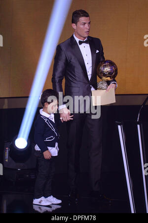 Zurich, Switzerland. 13th Jan, 2014. Portuguese soccer player Cristiano Ronaldo of Real Madrid celebrates with his son Cristiano Ronaldo junior after being awarded the FIFA Men's World Player of the Year during the FIFA Ballon d'Or Gala 2013 held at the Kongresshaus in Zurich, Switzerland, 13 January 2014. Photo: Patrick Seeger/dpa/Alamy Live News Stock Photo