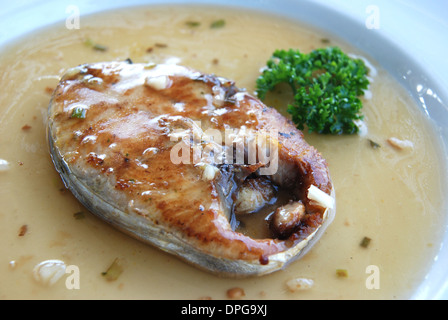 Fried King mackerel Fish with fish sauce Stock Photo