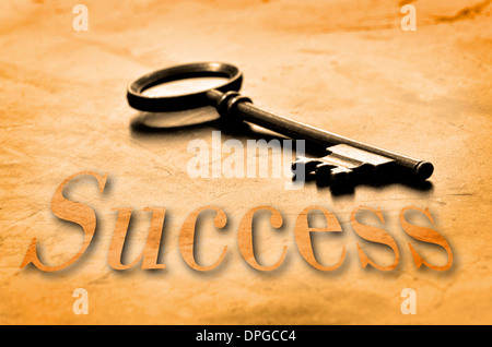 Key to Success on an old worn wooden desk top Stock Photo