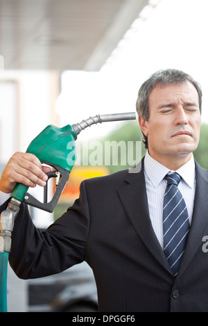 Consumers with few alternatives express frustration as gas prices soar and oil industry profits grow Stock Photo